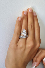 Deltora Diamonds Emerald Bezel Set Cut Eternity Wedding Ring made with sustainable lab diamonds.