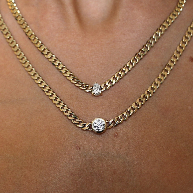 Gold chain with round and Pear cut diamond