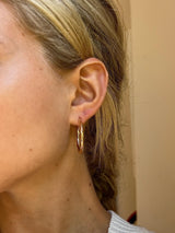 large gold twisted earring