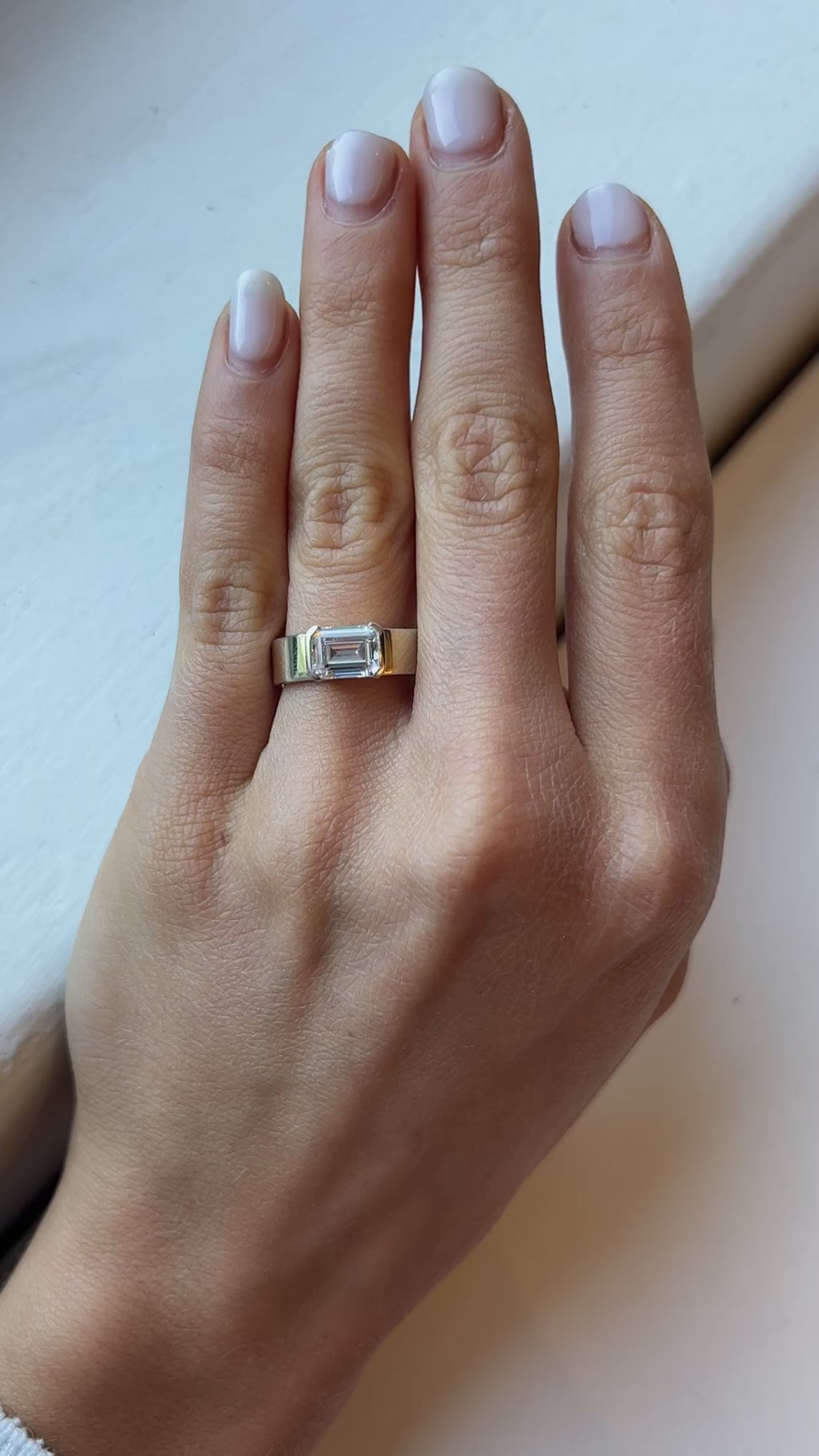 Emerald Cut Engagement Ring with Half Bezel