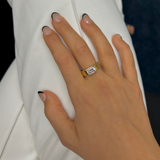 Deltora Diamonds Half Bezel Set Emerald Diamond Cigar Band Engagement Ring made from Sustainable Lab Diamonds.