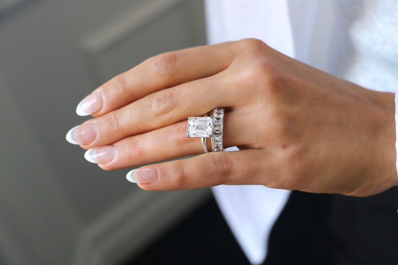 Deltora Diamonds Emerald Bezel Set Cut Eternity Wedding Ring made with sustainable lab diamonds.