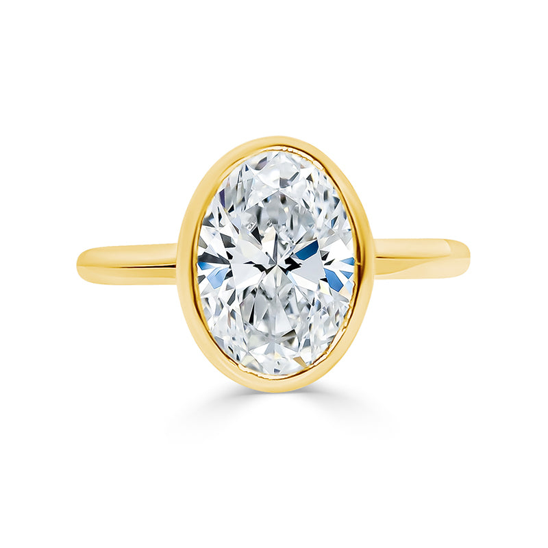 Oval Cut Thin Band Bezel Set Engagement Ring. Deltora Diamonds Sustainable Lab Diamond Jewellery.