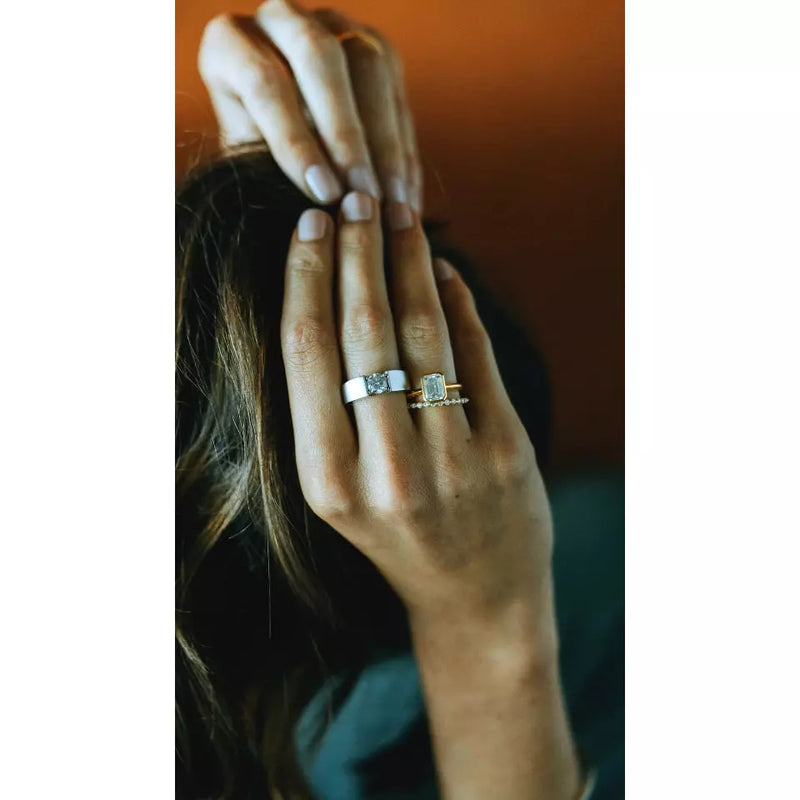 Tension set emerald cut diamond ring on sale
