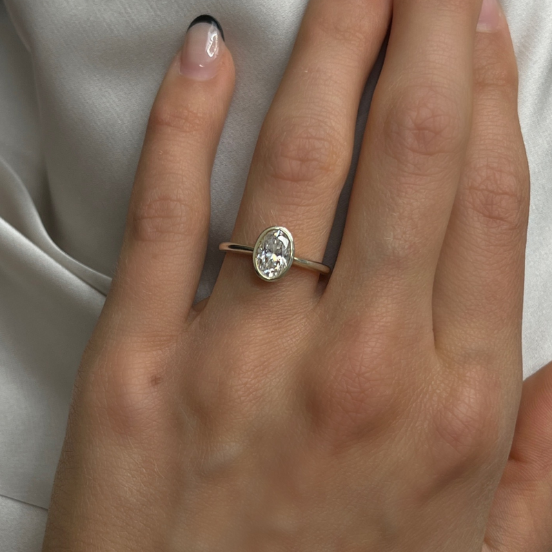 Unique Bezel Set Engagement Ring | Oval Cut